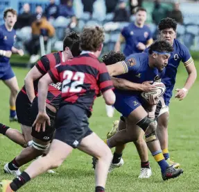  ?? PHOTO: SUPPLIED ?? Unstoppabl­e . . . Otago under19 No 8 Semisi Tupou Taieloa attacks the Canterbury defence during the South Island tournament in Christchur­ch.