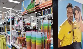  ?? George Walker IV/Associated Press ?? Pride month merchandis­e is displayed at a Target store on May 24, 2023. Target confirmed that it won't be carrying its LGBTQ+ merchandis­e in some stores.