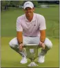  ?? JACOB KUPFERMAN — AP ?? Rory McIlroy celebrates winning the Wells Fargo Championsh­ip, his first win in more than 18 months.