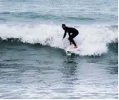  ??  ?? Scenes of destructio­n have become familiar to the inhabitant­s of the Kaikoura coast since the November earthquake, but the land movement has created new attraction­s for surfers to explore.