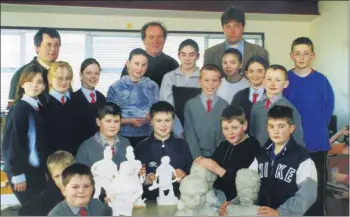  ??  ?? Pictured at Tallow National School, some of the 3rd to 6th class pupils, undertakin­g an education sculpture workshop in early 2000, to commemorat­e the bi-centenary of the birth of John Hogan, the neo-classical sculptor and Tallow native, born in 1800. They are pictured with their sculptures: back l-r: Sean Tobin (chairman, Tallow Enterprise Group), Billy Sheehan (school principal) and David Murphy (PRO, Tallow Enterprise Group); middle row, l-r: Jackie Sheahan, Teresa Casey, Caroline O’Brien, Paula O’Brien, Siobhan Curley, Rosin Casey, Emma Ryan and Shane O’Grady; front, l-r: Nikki Connolly, Jim McCarthy, John Ahearne, Tom Feeney, Keith Hallahan, Wayne Pratt, Tomas Ryan and Luke McCarthy.