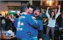  ?? JONATHAN BRADY/PA VIA AP ?? Leicester City fans react in Hogarths public house in Leicester, central England, after Chelsea’s Eden Hazard scores the equalizing goal against Tottenham in their English Premier League soccer match.