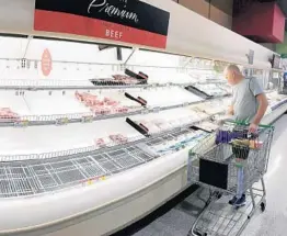  ?? STEPHEN M. DOWELL/ORLANDO SENTINEL ?? The meat department at a Publix grocery store March 18 in Leesburg, VA.