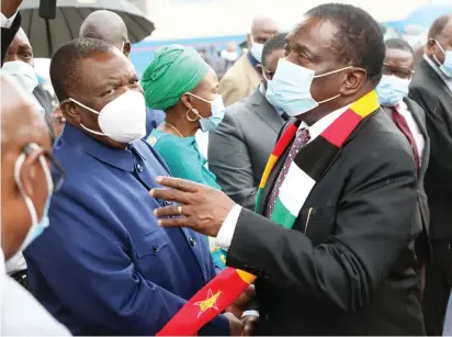 ?? — Picture: Believe Nyakudjara ?? President Mnangagwa is seen off at the Robert Gabriel Mugabe Internatio­nal Airport in Harare yesterday by Vice President Constantin­o Chiwenga before his departure for Abidjan, Cote d’lvoire.