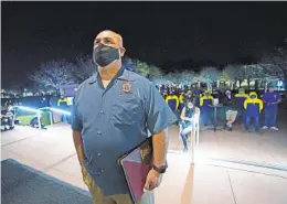  ?? NELVIN C. CEPEDA U-T ?? Union organizer Salvador Abrica, standing in the overflow area, listens to Chula Vista council members question Republic Services officials on Tuesday.