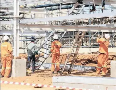  ?? PHOTO: SUPPLIED ?? Men at work on First Quantum Minerals’ Spanish-based Sentinel mine. First Quantum’s Clive Newall says the company has agreed to a tariff increase, to about $0.09 a kilowatt hour, provided that the Kansanshi smelter and Sentinel mine can each import a...