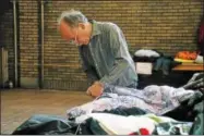  ?? LEAH MCDONALD - ONEIDA DAILY DISPATCH ?? Volunteers sort through winter gear donations at the First United Methodist Church at 116W. Grove St. on Wednesday, Nov. 8, 2017. The giveaway will be held on Saturday, Nov. 11, 2017, from 9a.m. to noon at the church.