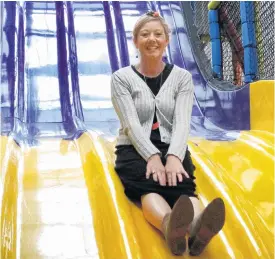  ?? PHOTO: DANIEL BIRCHFIELD ?? Playtime . . . Harbour St Collective Cafe owner Anna King testrides a slide at the cafe’s indoor playground, which is set to open to the public next week.