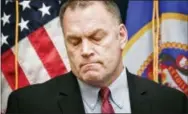  ?? THE ASSOCIATED PRESS ?? Minn. Rep. Dave Baker, R-Willmar, reacts after watching the “Dose of Reality” video depicting a parent who can’t wake her child who overdosed on an opioid.
