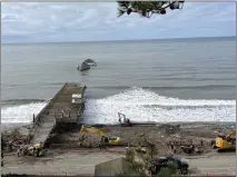  ?? PK HATTIS — SANTA CRUZ SENTINEL ?? Work to demolish the storm-damaged Seacliff pier got underway Monday and is expected to take six weeks to complete.