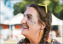  ??  ?? Tess Yarbrough, seen Oct. 13 at ACL Fest, uses glitter as a daily accessory in tribute to her hardworkin­g mother.