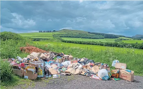  ?? Picture: Kenny Smith. ?? An example of fly-tipping on the outskirts of Auchterhou­se, near Dundee.