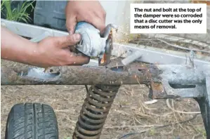  ??  ?? The nut and bolt at the top of the damper were so corroded that a disc cutter was the only means of removal.