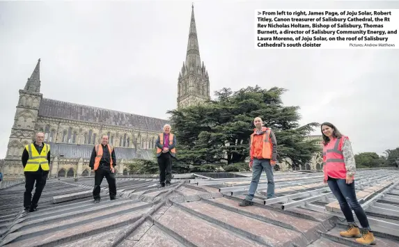  ?? Pictures: Andrew Matthews ?? From left to right, James Page, of Joju Solar, Robert Titley, Canon treasurer of Salisbury Cathedral, the Rt Rev Nicholas Holtam, Bishop of Salisbury, Thomas Burnett, a director of Salisbury Community Energy, and Laura Moreno, of Joju Solar, on the roof of Salisbury Cathedral’s south cloister