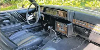  ??  ?? Custom bucket-seat interior with 442 badging and a four-speed manual transmissi­on are features of Russ Hallbauer’s restored Oldsmobile.