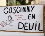  ??  ?? En bas : le portail s’est paré d’un panneau explicite et non dépourvu d’humour pour la référence au père du Petit Nicolas, le dessinateu­r René Goscinny qui a donné son nom à l’école «en deuil» depuis hier.