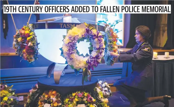  ?? Picture: Eddie Safarik ?? Tasmania Police Deputy Commission­er Donna Adams lays a wreath at the Rokeby Police Academy.