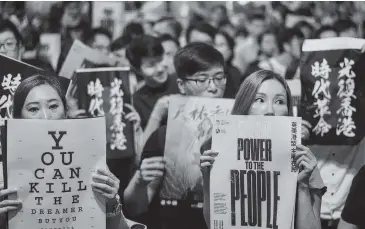  ?? VATSYAYANA Getty Images ?? Young demonstrat­ors in Hong Kong forced its government to back off of legislatio­n to extradite people to China for trial.