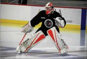  ?? SUBMITTED PHOTO — ZACK HILL ?? Flyers goalie Brian Elliott warms up during a high-intensity practice Monday at the Skate Zone in Voorhees, N.J.