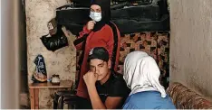  ?? | Reuters ?? SHADI Lababidi, 16, with his mother and sister at their home in Tripoli.