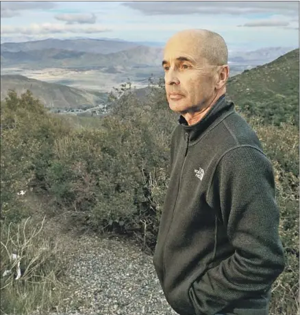  ?? Mark Boster For The Times ?? DON WINSLOW stands on a hilltop in San Diego County that once had a view of illicit border activity spilling into Borrego Valley.