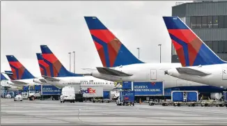  ?? HYOSUB SHIN / HSHIN@AJC.COM ?? Delta says it has been meeting with the pilots union regularly since negotiatio­ns started in April and “remains committed to ensuring our pilots have a strong contract.” The current labor contract for Delta pilots was struck in late 2016 with a term that lasts through 2019.