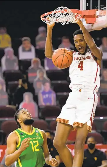  ?? JOHN MCCOY GETTY IMAGES ?? Bill Walton says Evan Mobley of USC and LJ Figueroa of Oregon should be meeting later in tournament.