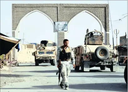  ?? PICTURE:AP ?? An Afghan security guard in Ghazni city.