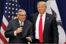  ?? MARY ALTAFFER - THE ASSOCIATED PRESS ?? In this 2016 file photo, then-Republican presidenti­al candidate Donald Trump is joined by Joe Arpaio, the sheriff of metro Phoenix, at a campaign event in Marshallto­wn, Iowa. President Donald Trump has pardoned former sheriff Joe Arpaio following his...