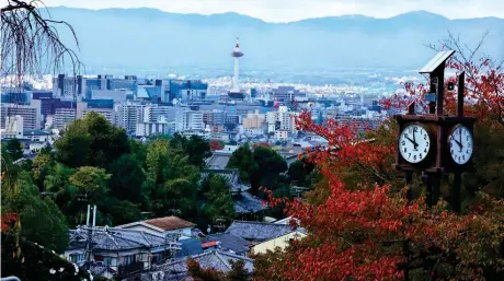  ?? ?? Morning, with a view of the Kyoto skyline and Kyoto Tower at its heart