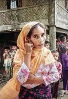  ?? HLA HTAY/AFP HLA ?? A Muslim woman is pictured at Maung Hnama village, Buthidaung township in Myanmar’s Rakhine state on July 13.