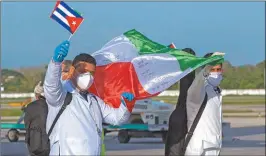  ?? AFP ?? BANDERA. Esta vez vendrán unos 500 profesiona­les.