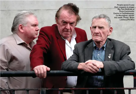  ??  ?? People queue to pay their respects to singer Big Tom McBride at Oram Community Centre in Castleblay­ney, Co Monaghan, earlier this week. Photo: Brian Lawless/PA Wire