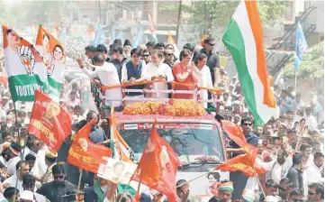  ??  ?? Gandhi accompanie­d by his sister Priyanka as he arrives to file his nomination papers for the general election, in Amethi in the northern state of Uttar Pradesh, India. — Reuters photos