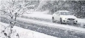  ?? OWEN HUMPHREYS ?? Heavy snow starts to fall in County Durham yesterday