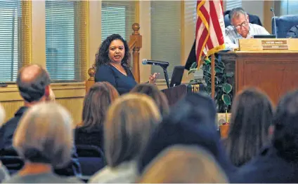  ?? Photos by Ronald Cortes / Contributo­r ?? Parent Heather Ramon-Ayala told East Central ISD’s board she was concerned about the mental state of staffers who might carry weapons, and she started to describe being told about a teacher having a breakdown. She wasn’t allowed to finish her comments.
