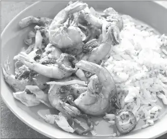  ?? Associated Press photo ?? This undated photo provided by America’s Test Kitchen shows Crispy Salt and Pepper Shrimp in Brookline, Mass.