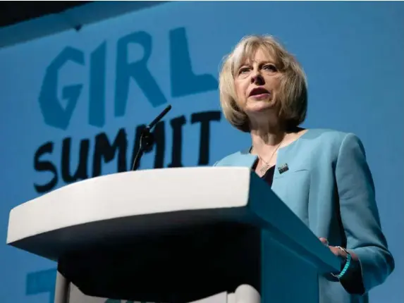  ??  ?? Theresa May establishe­d the unit at the 2014 Girl Summit (Getty)