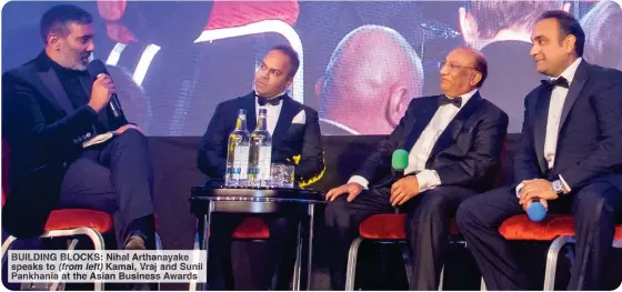  ?? ?? BUILDING BLOCKS: Nihal Arthanayak­e speaks to (from left) Kamal, Vraj and Sunil Pankhania at the Asian Business Awards