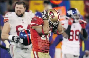 ?? EZRA SHAW/ GETTY IMAGES ?? Kyle Williams of the San Francisco 49ers holds his head after he fumbled the ball on a punt return Sunday, which the New York Giants recovered in overtime and went on to win the NFC Championsh­ip 20- 17 at Candlestic­k Park in California.