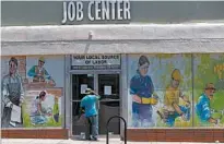  ?? DAMIAN DOVARGANES/AP ?? The Pasadena Community Job Center in California helps skilled day laborers find work, but it’s closed due to the coronaviru­s outbreak.