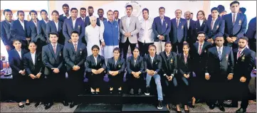  ?? HT PHOTO ?? Union sports minister, Rajyavardh­an Singh Rathore, with Asian Games winners at a felicitati­on ceremony in Delhi.