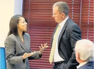  ?? RED HUBER/STAFF PHOTOGRAPH­ER ?? Orange-Osceola State Attorney Aramis Ayala chats Monday with 5th District State Attorney Brad King, picked by the Gov. Rick Scott to prosecute Markeith Loyd in killings of his ex-girlfriend and an officer.