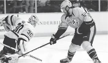  ?? MARK HUMPHREY/THE ASSOCIATED PRESS ?? Nashville Predators centre Frederick Gaudreau, seen shooting against Pittsburgh Penguins goalie Matt Murray in Nashville, Tenn., on Saturday, has three goals in the Cup final.