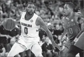  ?? AP/SEAN RAYFORD ?? South Carolina guard Sindarius Thornwell (0) scored 20 points, including 15 in the second half, to lead the No. 24 Gamecocks to a 57-53 victory over No. 19 Florida on Wednesday night at Colonial Life Arena in Columbia, S.C.