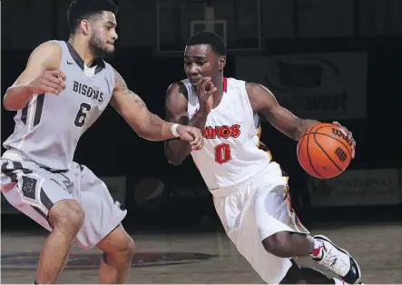  ??  ?? University of Calgary’s David Kapinga, shown here in a file photo, scored 15 points as the Dinos defeated the University of Northern British Columbia Timberwolv­es 85-75 in Canada West men’s basketball action. The Dinos return to Calgary for their home...