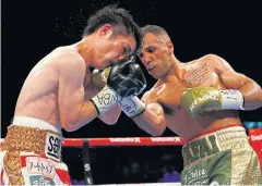  ?? REUTERS ?? Khalid Yafai, right, in action against Suguru Muranaka.