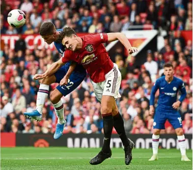  ?? —aFP ?? Following protocol: Captain Harry Maguire (centre) believes Manchester United are going to great lengths to ensure the well-being of players and staff.