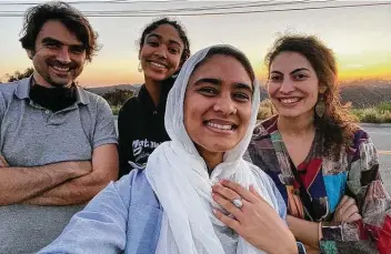  ??  ?? This undated photo provided by Ala’ Khan shows Jonathan Simcosky, from left, Maya Mansour, Ala’ Khan and Hadar Cohen, posing for a selfie while watching a sunset in celebratio­n of the start of Ramadan.