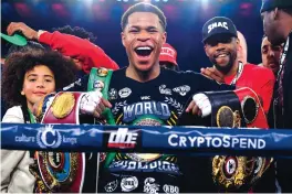  ?? JAMES ROSS/ASSOCIATED PRESS ?? Devin Haney celebrates after his victory over Australia’s George Kambosos in Melbourne. Haney now holds all four of the widely recognized lightweigh­t world titles.